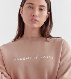 Fashion + Beauty Assembly Label | Logo Fleece Womens | Sand/White